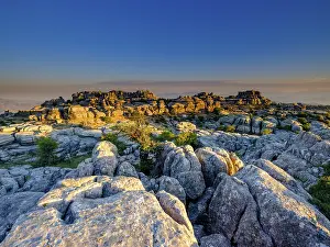Eroded Limestone Landscape Prints: Limestone rock formations at sunset