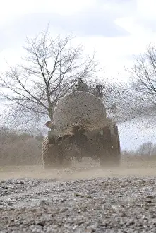 Agricultural Field Work Prints: Liquid manure is distributed on field