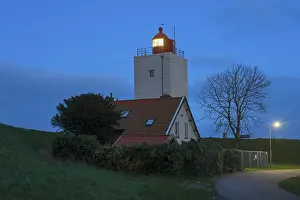 Listed Building Conservation Prints: Listed De Ven lighthouse in the evening