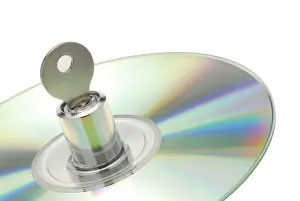 Data Theft Prevention Prints: Lock with key in a CD
