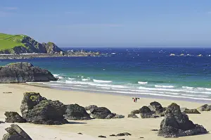 Deserted Scottish Beach Prints: Long sandy beach with single rocks and cliffs