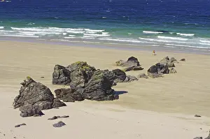 Steep Cliff Landscape Prints: Long sandy beach with single rocks and cliffs