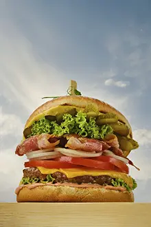 American Fast Food Meal Prints: Low angle view of beef burger with bacon
