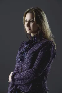 Low Key Portrait Photography Prints: Low key portrait of size plus model in blouse posing in studio