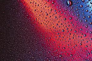 Close Up Raindrop Prints: Macro abstract drops water bright surface