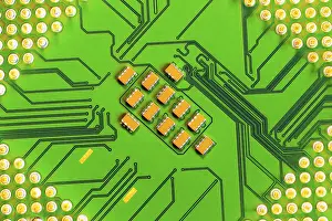 Macro Electronic Components Prints: Macro Close up of microchips and pins on Main CPU PC processor circuit board