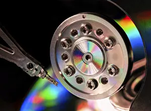 Electronic Data Storage Prints: Macro of an open computer hard drive with the read write head
