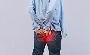 Stomach Pain Relief Prints: Man with digestive problem touching his buttock