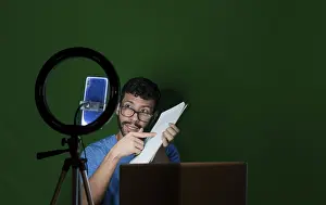 Video Call Concept Prints: Man giving classes in a video call