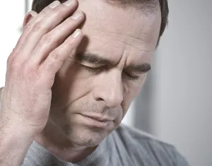 Migraine Symptoms Prints: Man with headache