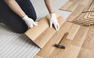 Parquet Floor Design Prints: Man installing laminated floor