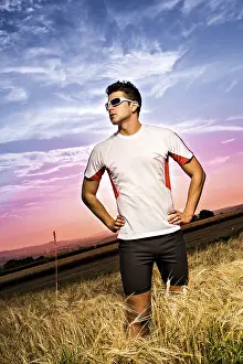 Athletic Man Prints: Man jogging through the fields