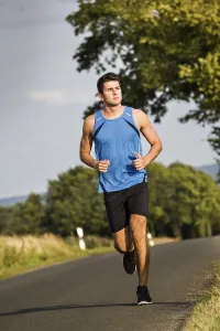 Recreational Activity Prints: Man jogging through the fields