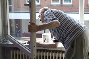 Portrait Of A Painter Prints: Man paint windows