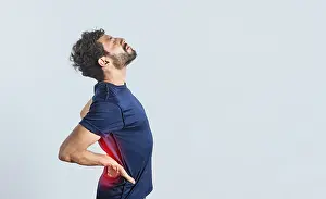 Man With Backache Prints: Man with spine problems, person with back problems on isolated background