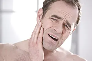 Caucasian Male Portrait Prints: Man with toothache