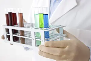 Scientific Researcher Prints: Man working on an experiment in a laboratory