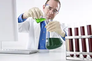 Scientist Experiment Prints: Man working on an experiment in a laboratory