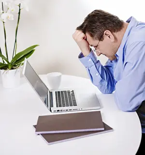 Man Working On Computer Prints: Man working on personal computer