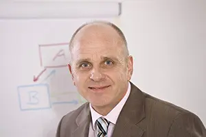 Business Strategy Planning Prints: Manager standing in front of a flip chart