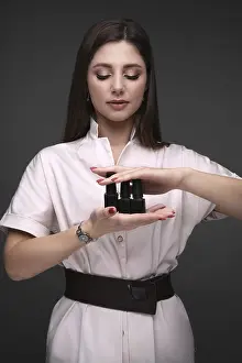 Professional Nail Technician Prints: Manicurist in working form with tools in hand