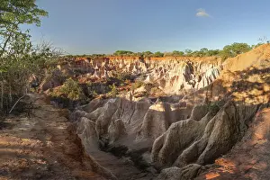 Eroded Rock Formations Prints: Marafa (Hell's kitchen) canyon cliffs in sunset light
