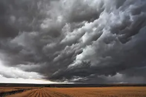Dark Stormy Atmosphere Prints: The massive storm cloud covered the sky