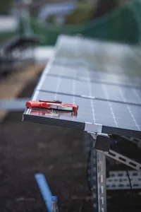 Solar Energy Installation Prints: Solar modules and tools on a rack