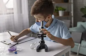 Classroom Education Prints: Medium shot kid learning with microscope