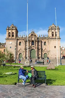 Peruvian Architecture Prints: Two men talking on a bench in front of the Cusco Cathedral