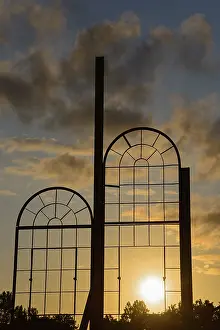 Northern German Landscapes Prints: Two metallic window frames stand out against the dramatic sunset sky