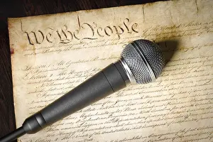 Symbolic American Image Prints: Microphone resting on the U.S. constitution