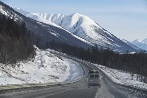 Deserted Russian Roads Prints: Minivan driving on the Road of Bones