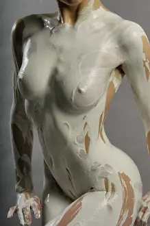 Studio Shot Of A Female Model Prints: Model covered in white plaster
