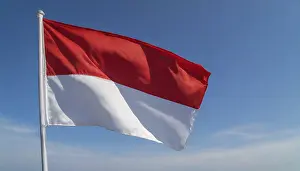 Monaco Flag Prints: The Monaco flag flutters in the wind