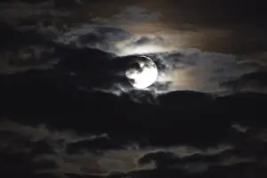 Full Moon At Night Prints: Full moon shines through the clouds