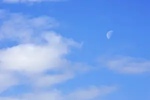 Clear Daytime Skies Prints: The moon on the sky