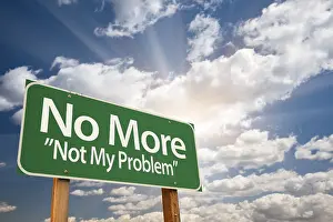 Cloudy Dramatic Sky Prints: No more, not my problem green road sign with dramatic clouds and sky