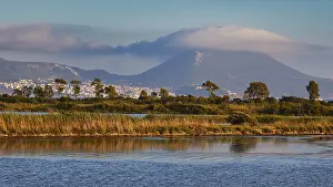 Landscape Photography Balkans Prints: A mountain covered with clouds in the background