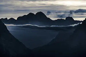 UNESCO World Heritage Site Dolomites Prints: Mountain top of the Dolomites with dramatic cloudy sky