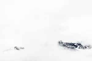 Austria Mountain Peaks Prints: Mountain peak rises from clouds