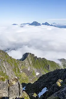 Mountain Peak View Prints: Mountain peaks above the clouds