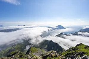 Mountain Peak View Prints: Mountain peaks above the clouds