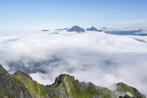 Mountain Peak View Prints: Mountain peaks above the clouds