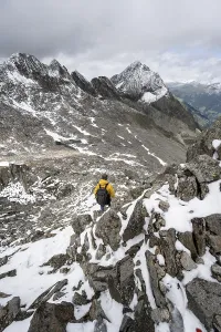 Mountaineer in rocky mountain landscape