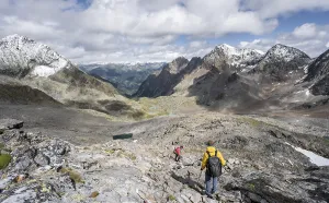 Two mountaineers in a rocky mountain landscape