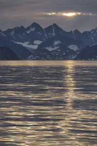 Uninhabited Coastal Landscape Prints: Mountains in the evening light