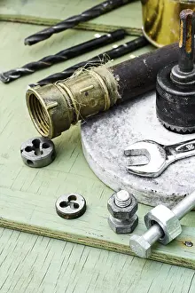 Industrial Repair Equipment Prints: Mounting and threading tool background iron pipes