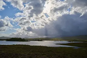 Scottish Countryside Landscape Prints: Natural lakeside landscape with dramatic cloud cover and light rays