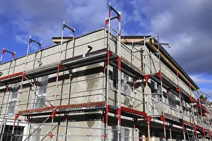 Single Family Home Construction Prints: New building with completed basic rendering of the exterior facade New building with completed basic rendering of